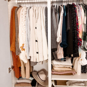 White Non-Slip Jumper Hangers With Garments On in Wardrobe