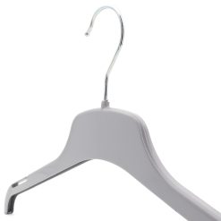 Angled closeup picture of grey plastic clothes hanger
